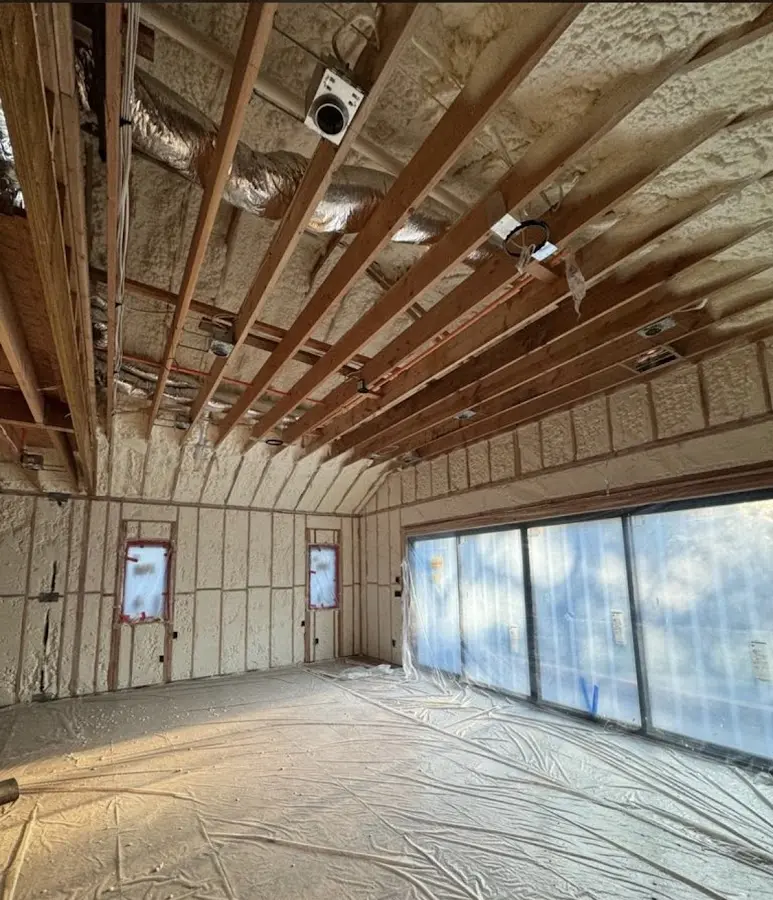 Interior walls and ceiling insulated with spray foam during new construction in Fanwood